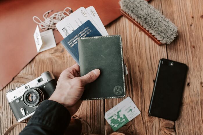 Modern traveler organizing luggage